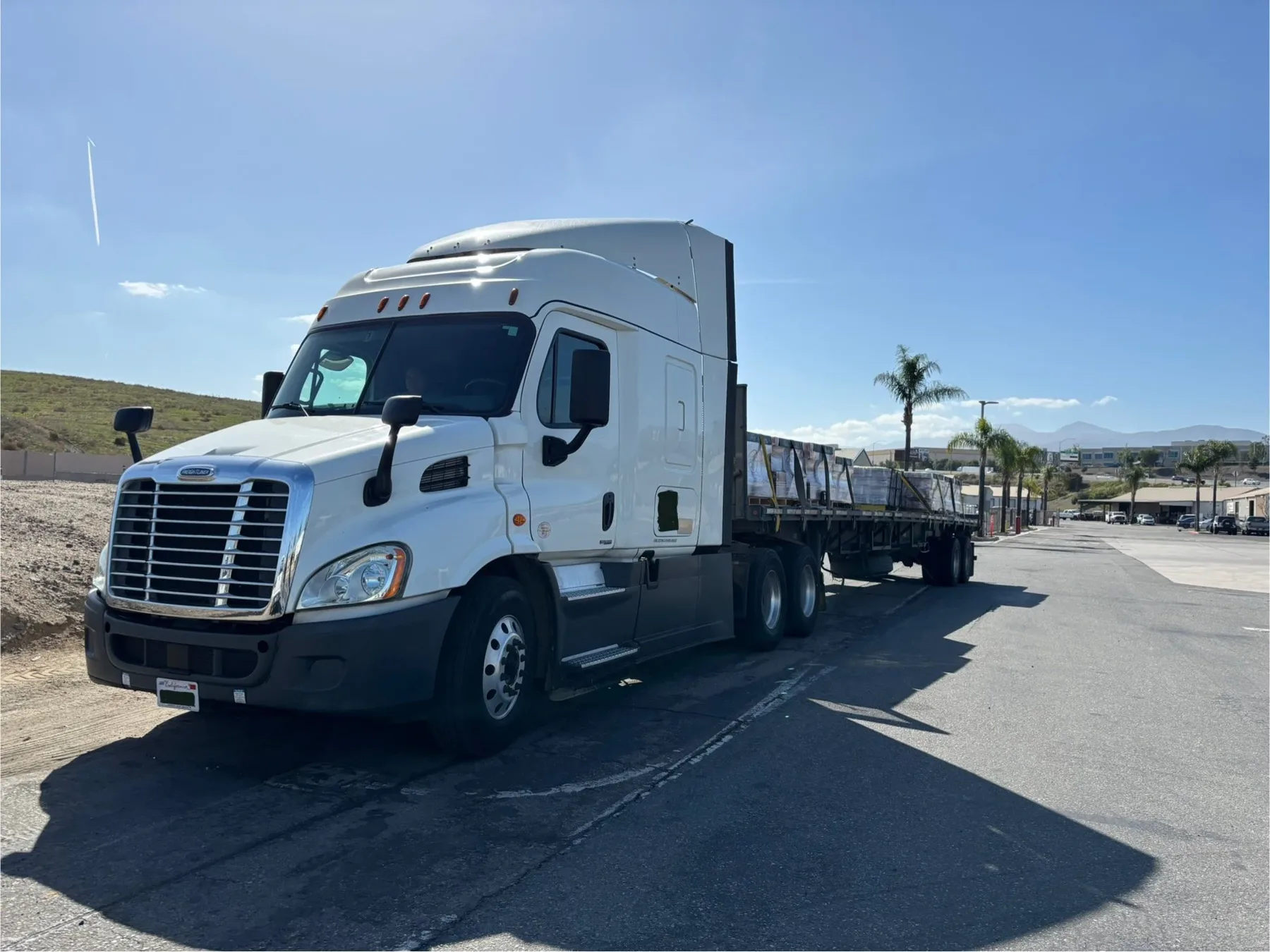 Freightliner flatbed big rig inspected on site